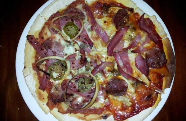 Seni Unik Dalam Menghidangkan Pizza