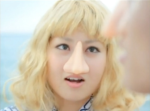Japanese : You westerners have big long nose while Anime characters have small nose