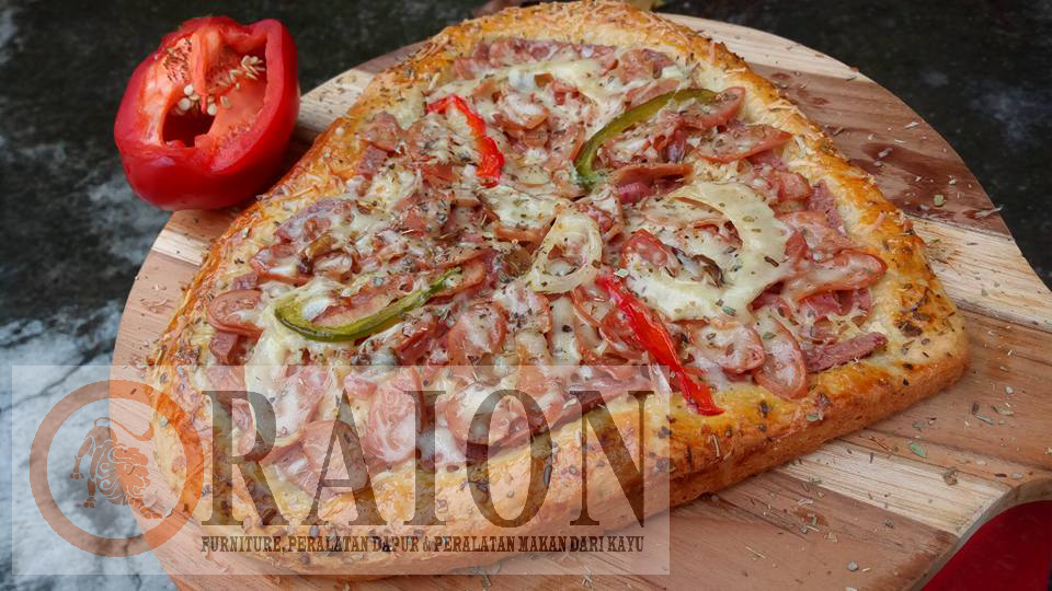 Seni Unik Dalam Menghidangkan Pizza