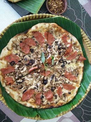 Seni Unik Dalam Menghidangkan Pizza