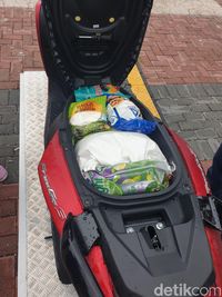 Emak-emak Ini Kaget FreeGo Bisa Angkut Beras 10 Kg di Bagasi