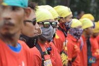 Hey Penguasa! Buruh Bersatu Tolak Upah per Jam