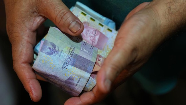 Melihat Beda Komponen THR PNS dan Buruh