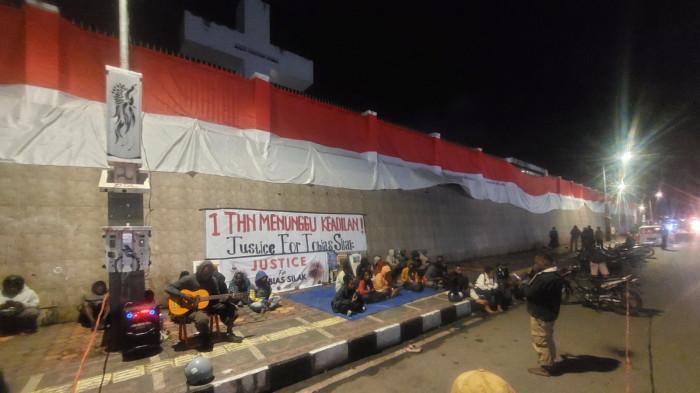 Setahun Tobias Silak Dibunuh Polisi, Massa Gelar Aksi Pasang Lilin di Wamena