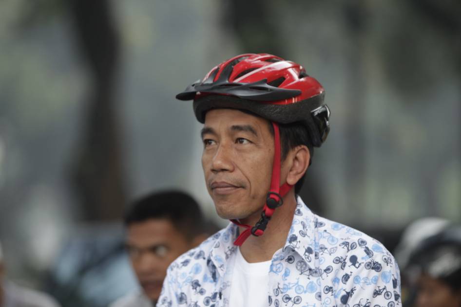 FOTO: Gowes Terjauh Jokowi, Lewat Macet dan Pasar