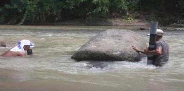 Batu Sungai Ini Diyakini Menyimpan Harta Karun