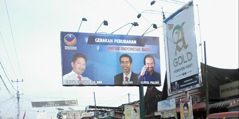 (BUKAN CUMA CALEG PDIP) Caleg Nasdem Pasang Foto Jokowi di Baliho