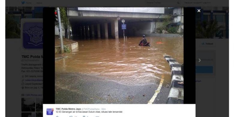 jalan-di-kolong-landmark-banjir-saluran-langsung-dibersihkan