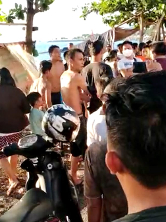 Viral Warga Manado Marahi Petugas Sambil Sebut Mandi di Pantai Obat Corona