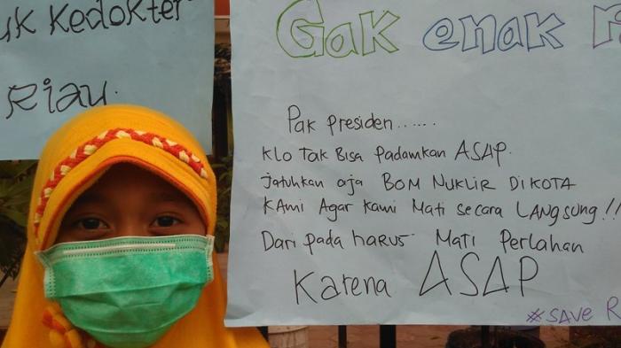 Bosan Kabut Asap, Siswa SD Minta Presiden Jokowi Jatuhkan Bom Atom