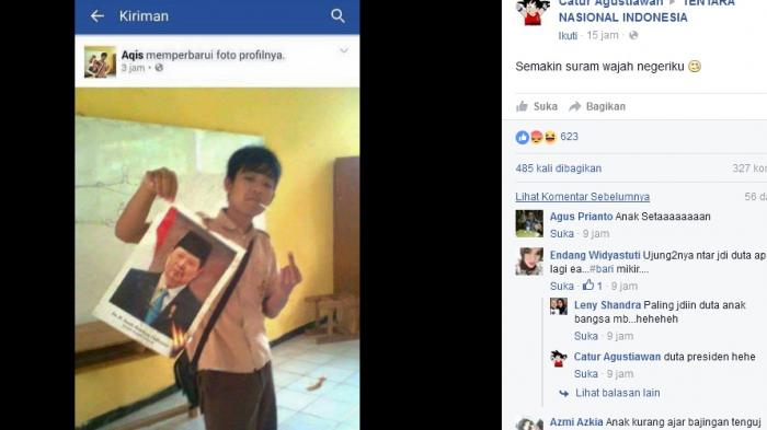 Beredar Foto Pelajar Berseragam Pramuka Bakar Gambar SBY Sambil Acungkan Jari Tengah