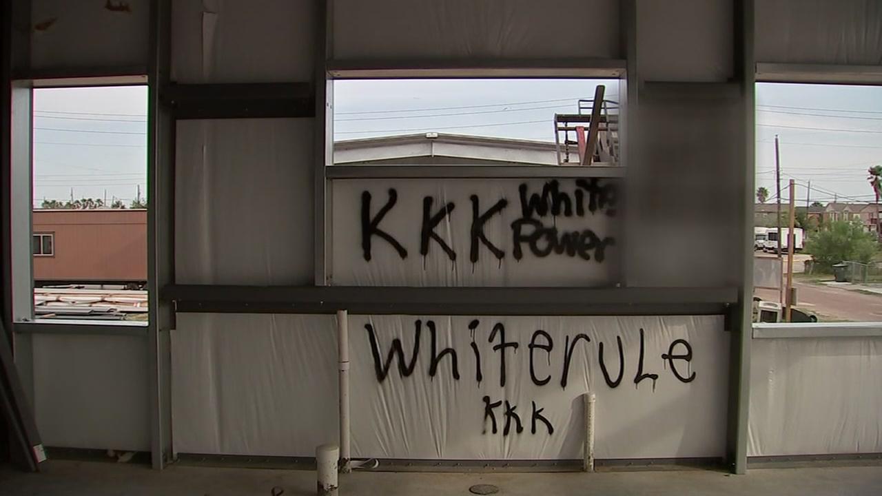 vandals-leave-quotkkkquot-and-quotwhite-powerquot-spray-painted-on-cars-and-church