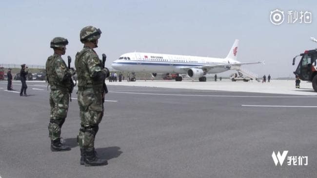 Flight attendant held hostage by armed passenger on Air China flight