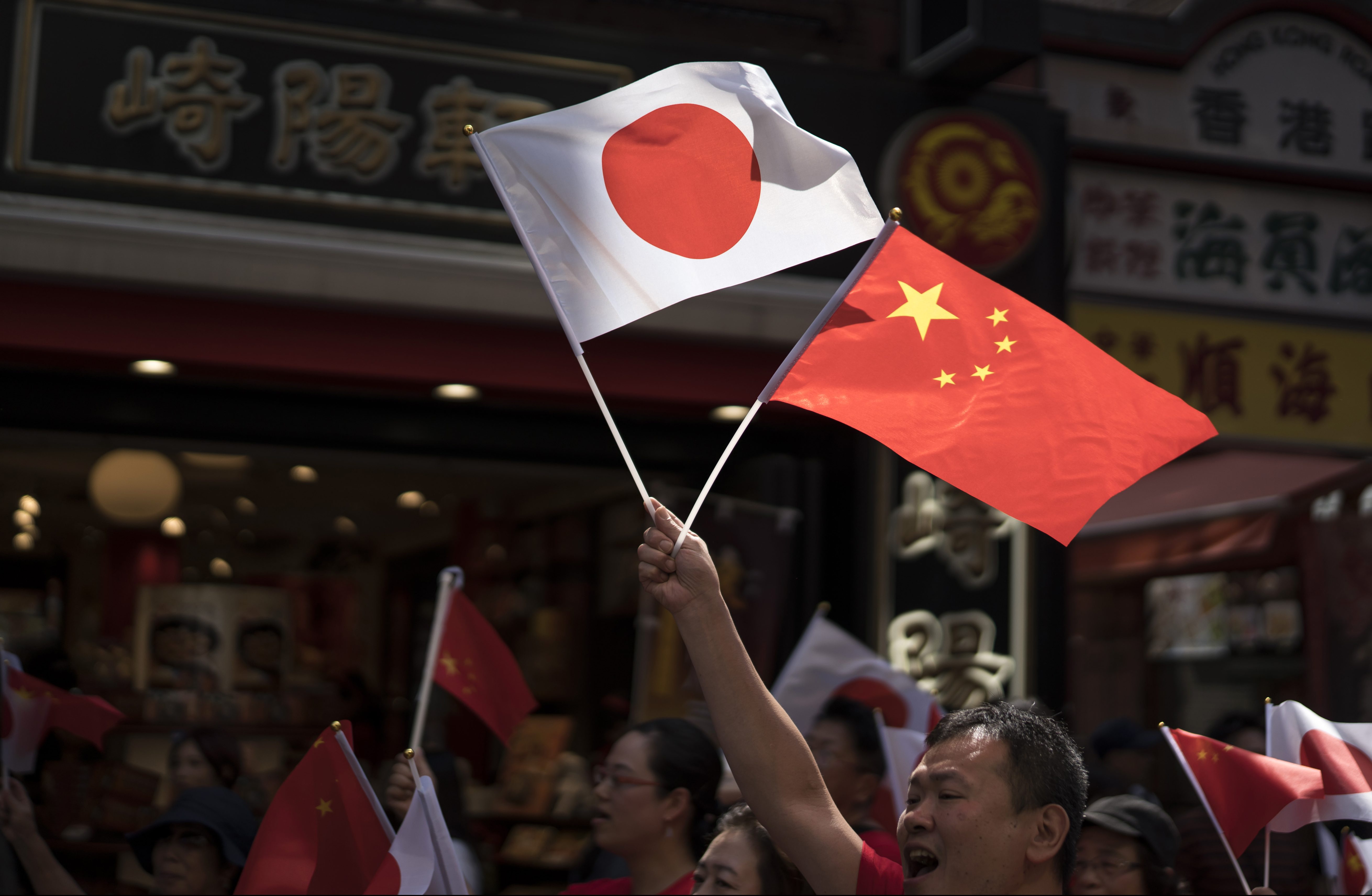“Lands apart, shared sky”: Japan’s response to the coronavirus is winning