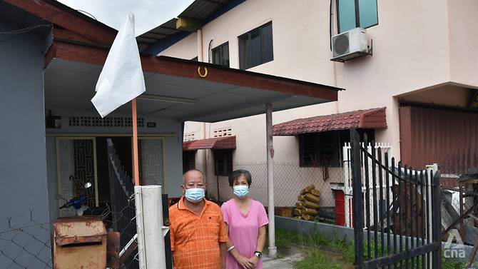 Desperate Malaysians fly white flags as a call for help to survive COVID-19 lockdown