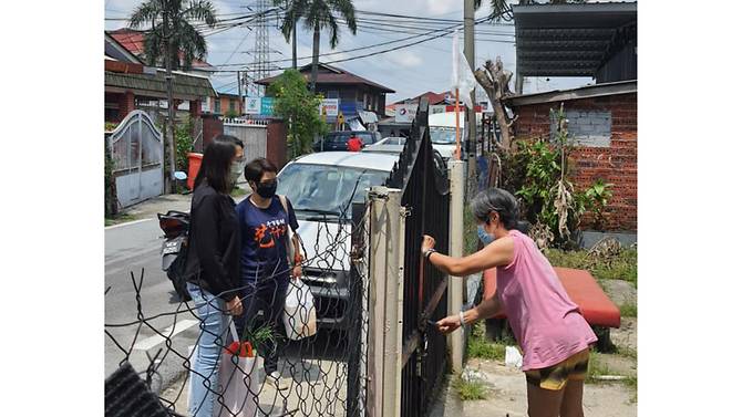Desperate Malaysians fly white flags as a call for help to survive COVID-19 lockdown