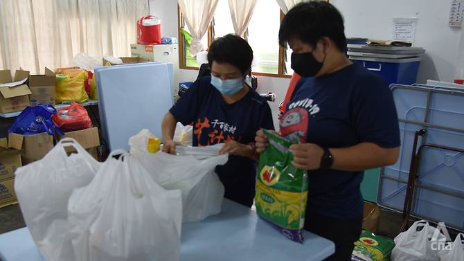 Desperate Malaysians fly white flags as a call for help to survive COVID-19 lockdown