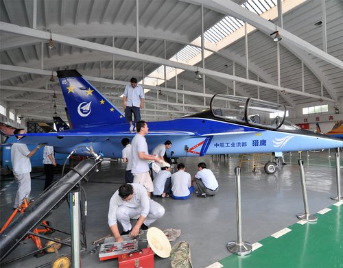 Chinese military assembly Line, 30 Years behind US eh?