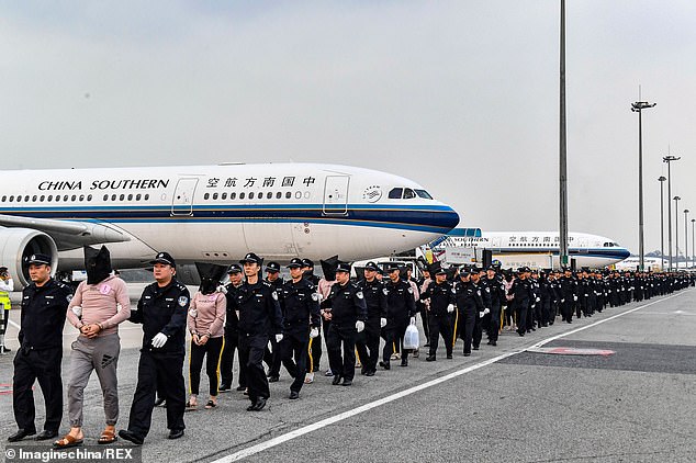 Hundreds of suspected telecom fraudsters are repatriated to China from Cambodia as Be
