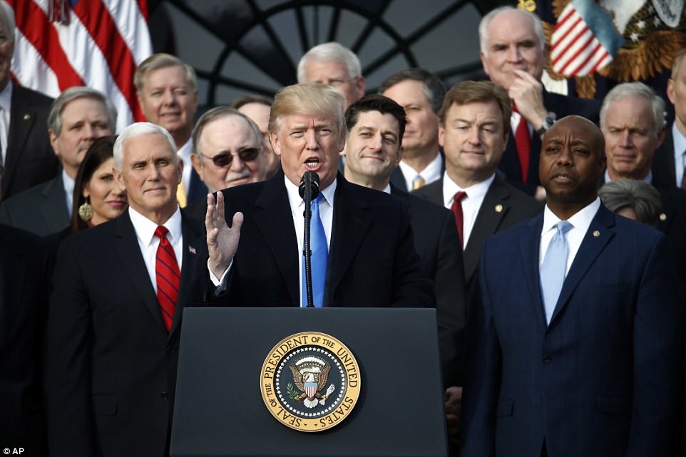 We are making America great again!': Trump hauls Republican lawmakers to the White