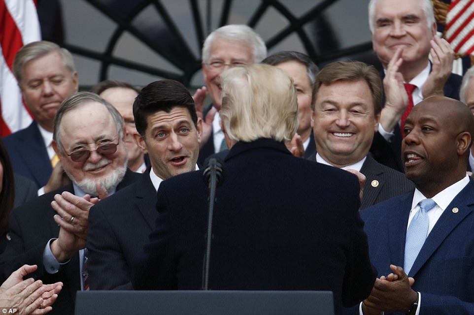 We are making America great again!': Trump hauls Republican lawmakers to the White