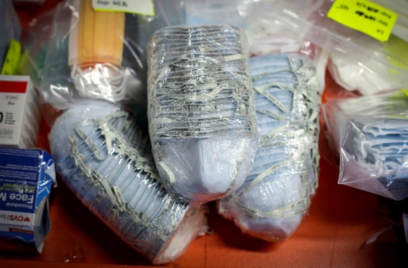 Illinois' governor organised secret flights to bring masks and gloves from China