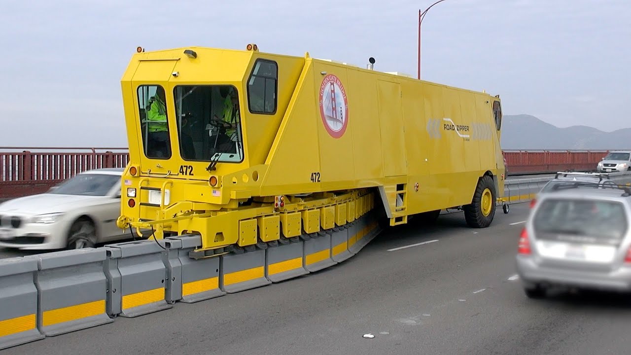 ROAD ZIPPER.. Kendaraan Canggih Pengatur Marka Jalan Saat Macet