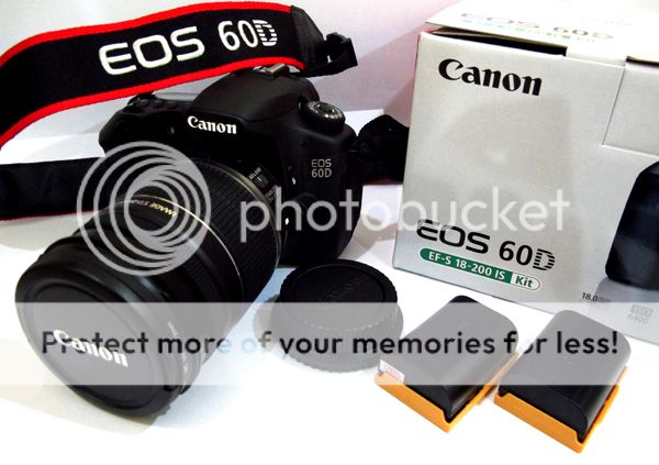 Terjual jual CANON EOS 60D + BG-E9 + EF-S 18-200MM + EF 