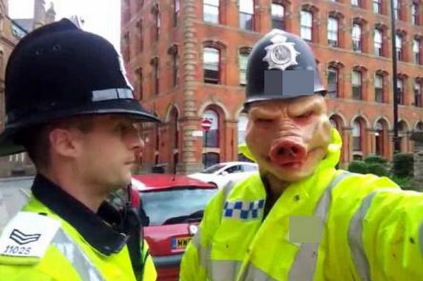 man-wearing-pig-mask-and-toy-bobby-s-helmet-arrested-on-suspicion-of-impersonating-a