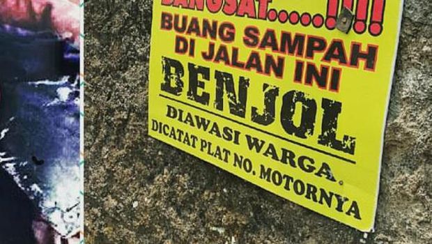 Ngakak banget gan, Spanduk kutukan bagi orang yang suka buang sampah sembarangan