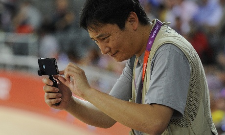 fotografer + iPhone untuk tugas liputan Olimpiyade 2012