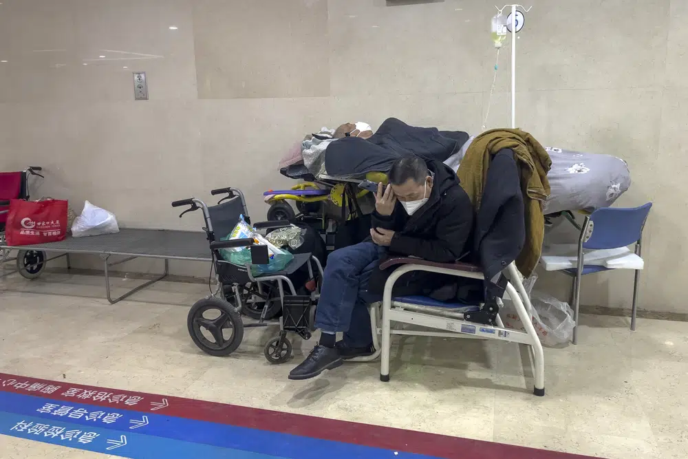 Beds run out at Beijing hospital as COVID-19 spreads