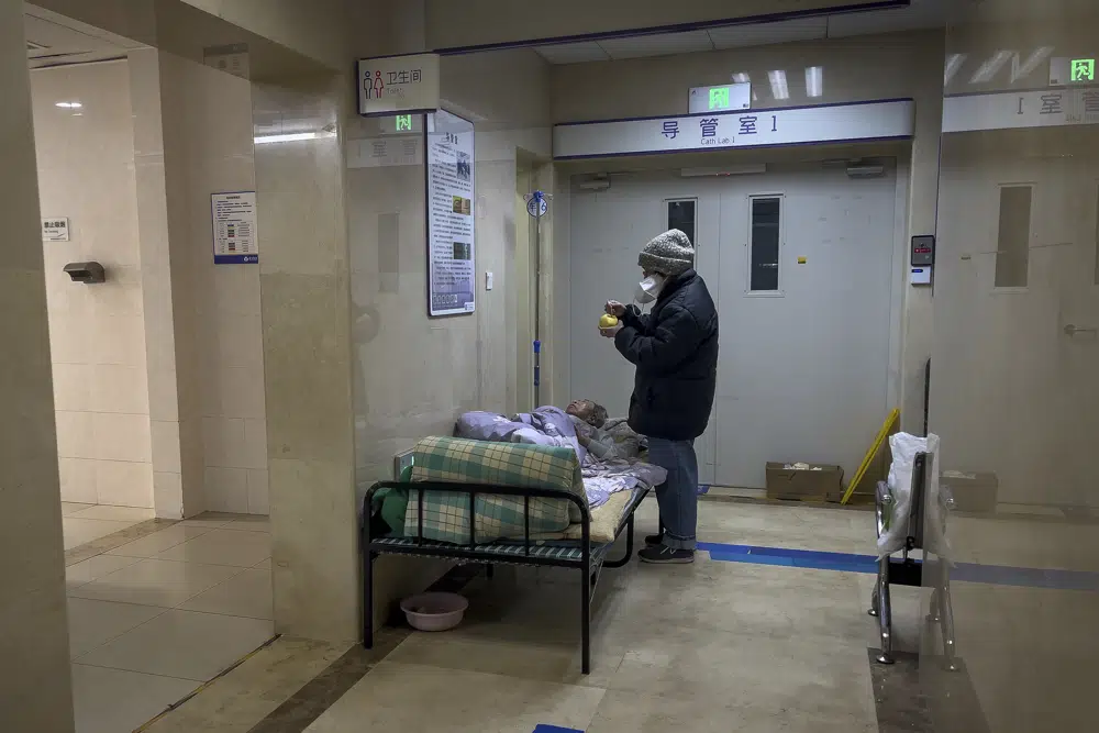 Beds run out at Beijing hospital as COVID-19 spreads