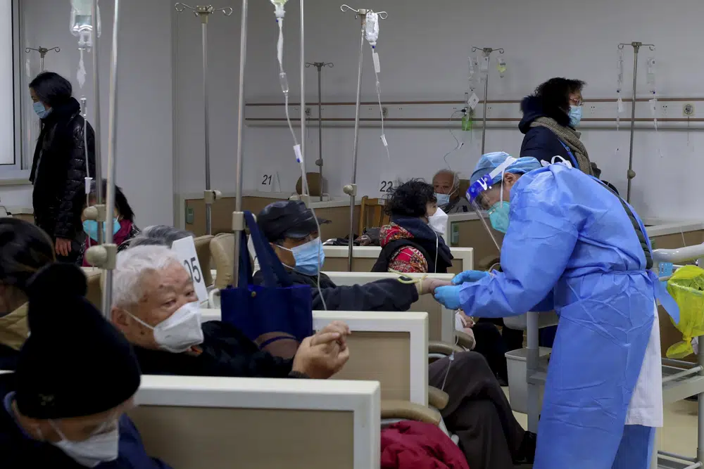 Beds run out at Beijing hospital as COVID-19 spreads