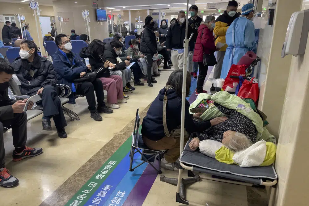 Beds run out at Beijing hospital as COVID-19 spreads