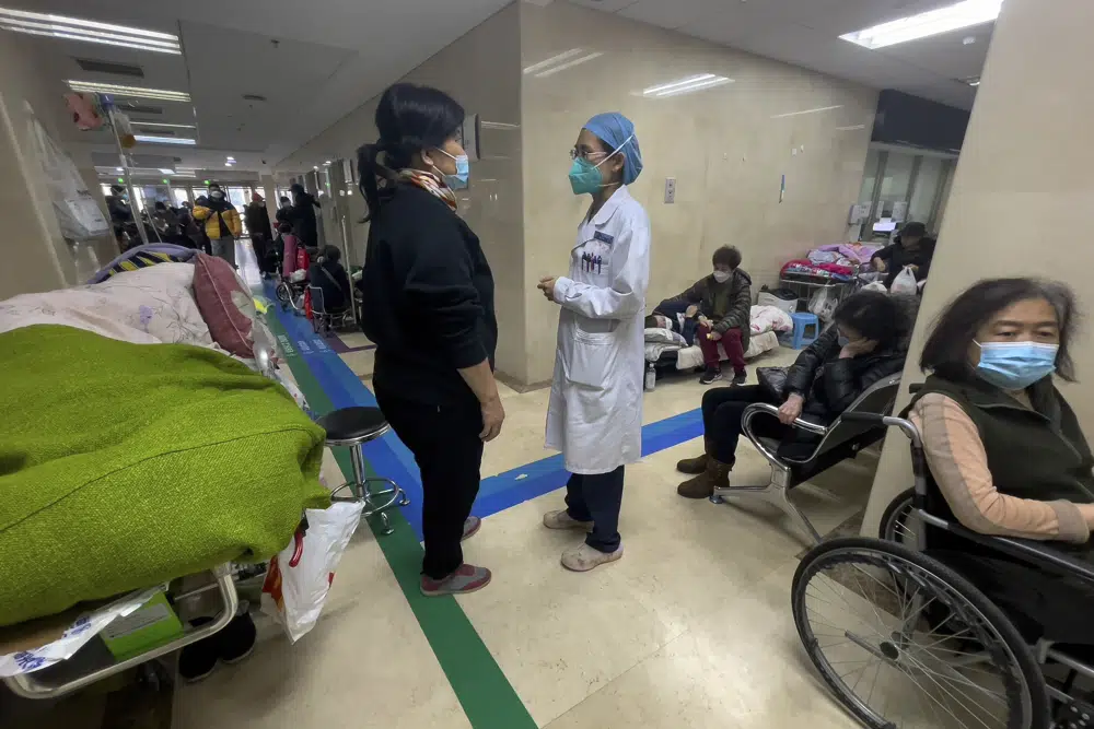 Beds run out at Beijing hospital as COVID-19 spreads