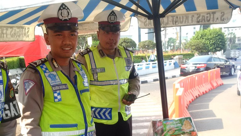 Salut! Brigadir Iskandar 'Nemplok' di Kap Taksi yang Kabur Saat Disetop